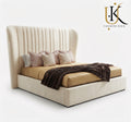 Corinthian wide headboard upholstered bed